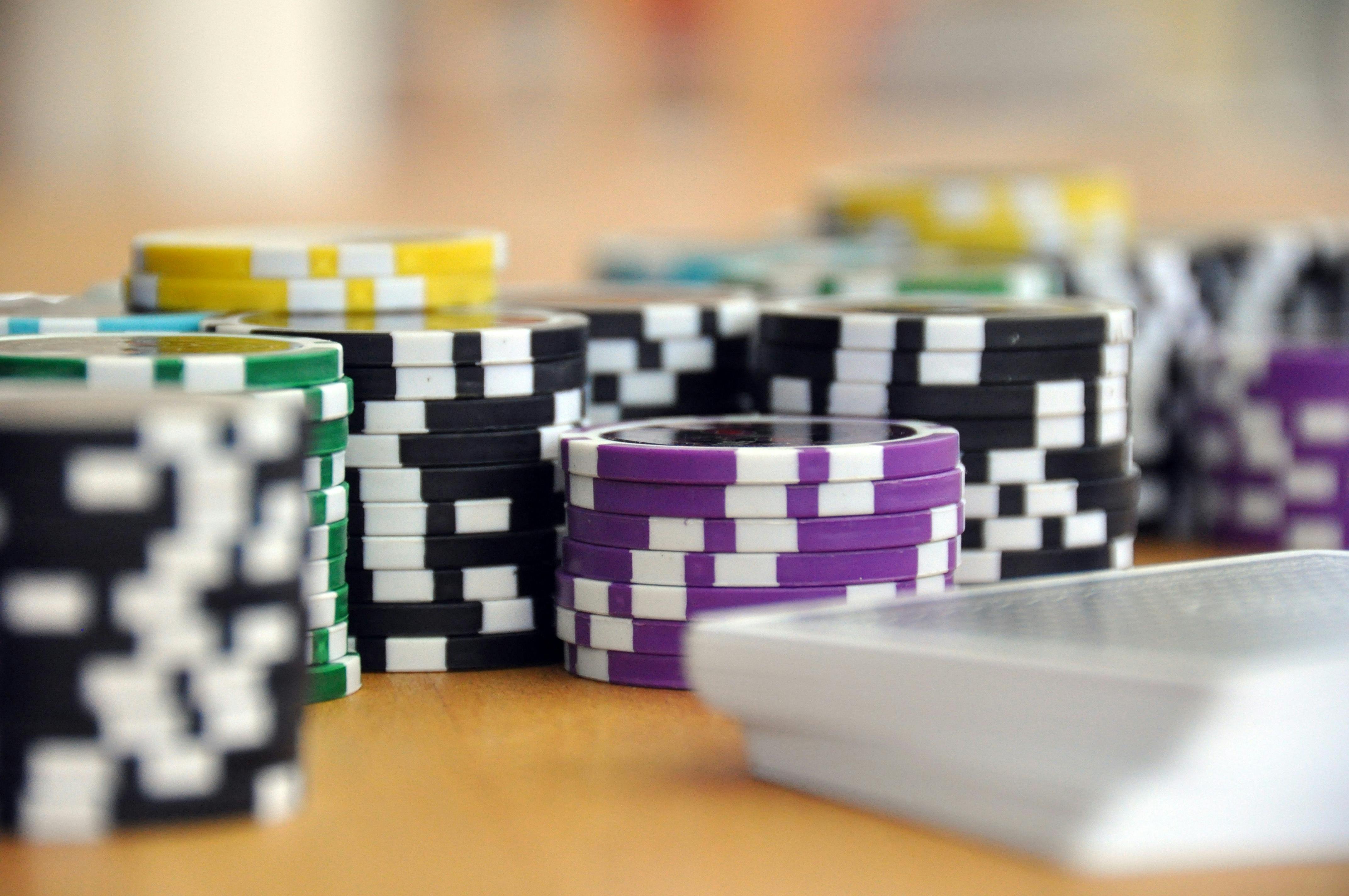 Poker hand ranking chart displayed on mobile device showing all combinations